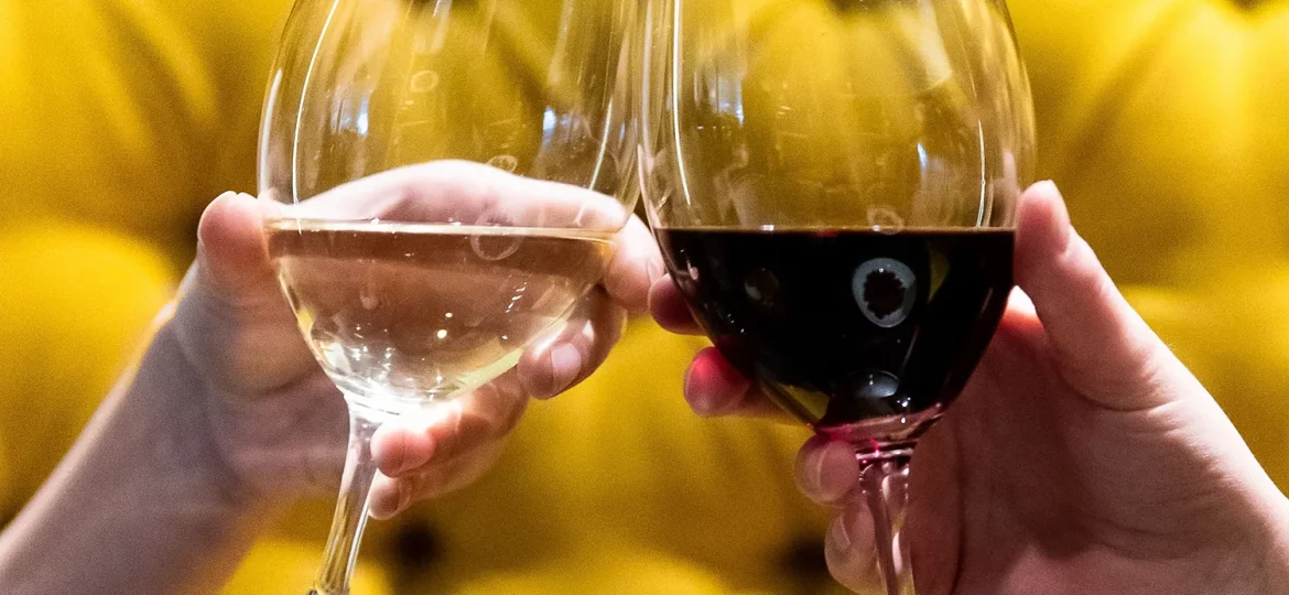 Two wine glasses in cheers